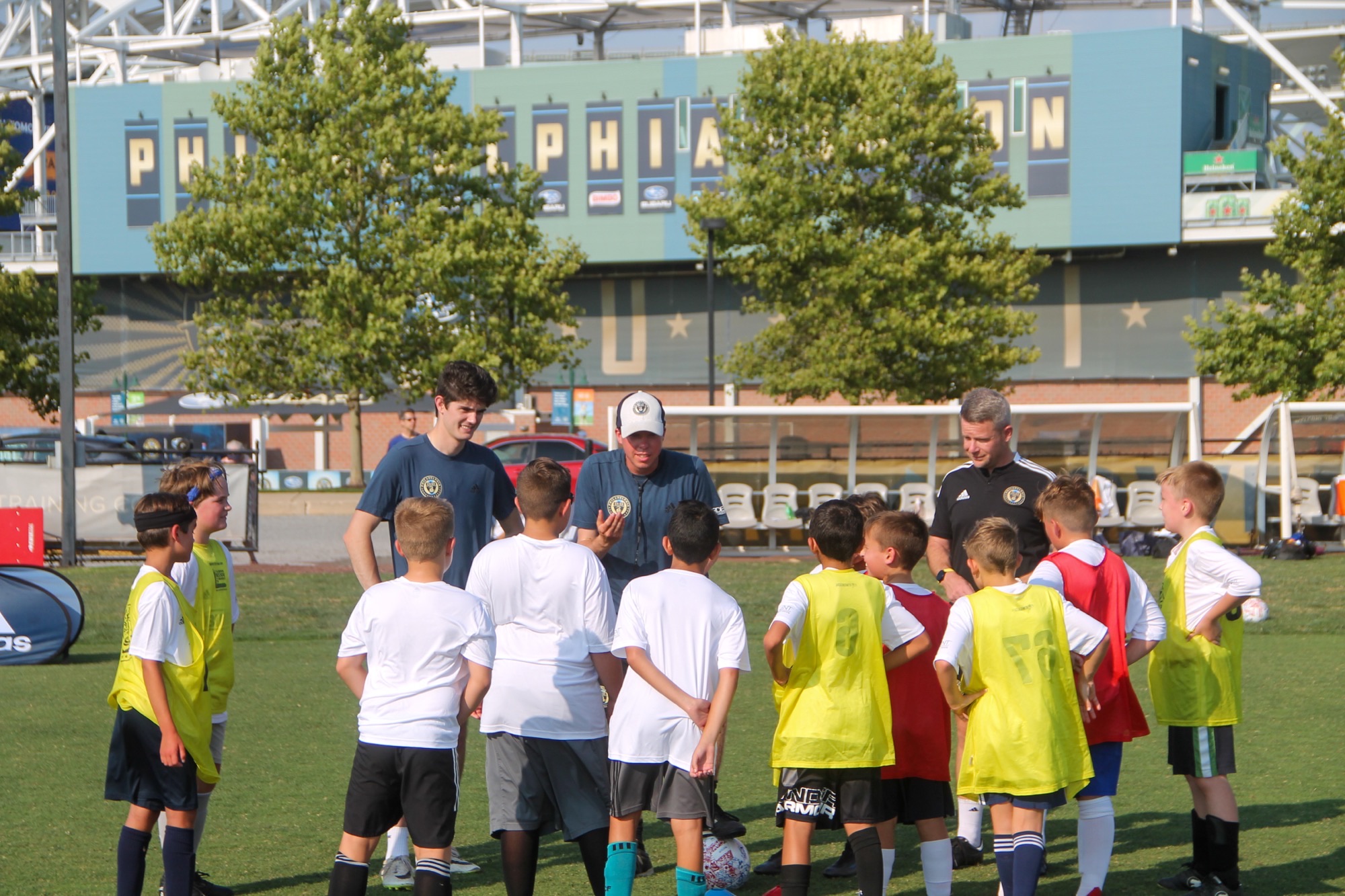 A group of kids at a soccer camp by the Philadelphia Union Stadium